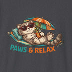 Cat wearing sunglasses and holding a drink under an umbrella with 'PAWS & RELAX' text on a dark background