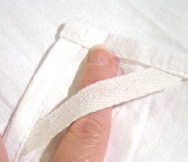 Hanging loop on upper (inside) corner of towel