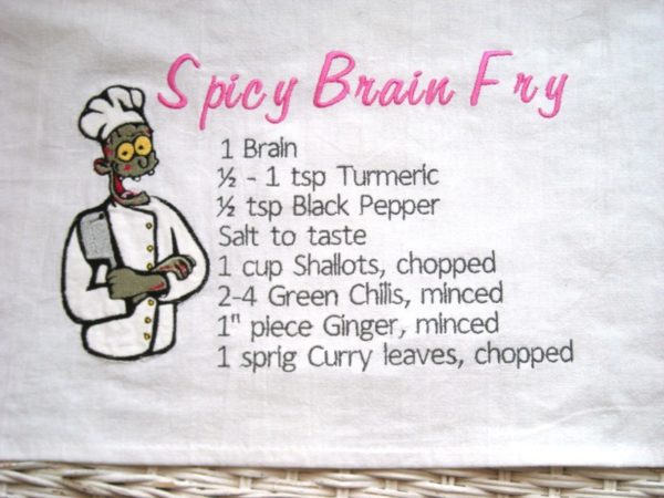 Zombie Chef's Spicy Brain Fry recipe on a large cotton dishtowel