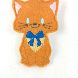 Toulouse, boy kitten finger puppet with blue eyes that glow in the dark