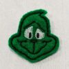 Grinch Pin by Ginger Beasties: Festive Embroidered Smiling Face