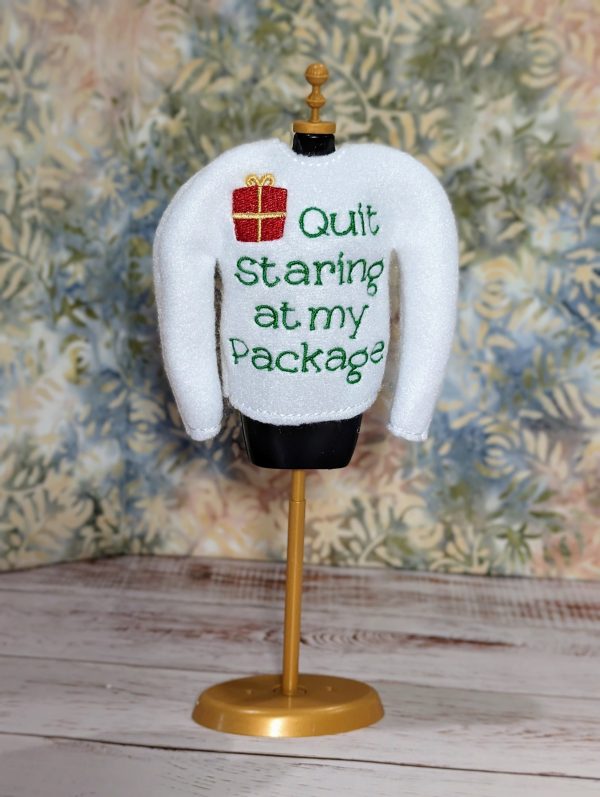 Unwrap the Laughter with Our 'Quit Staring at My Package' Elf Shirt!